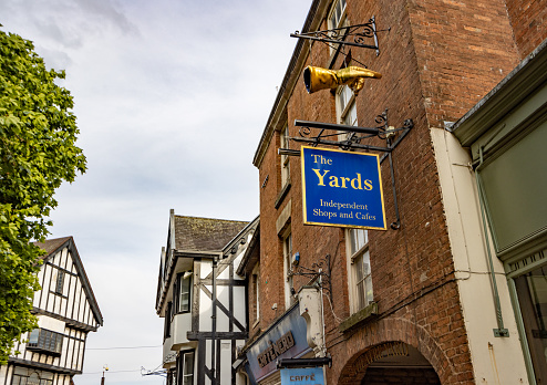 Theatre Yard in Chesterfield, England. This is a shopping area with a gold hand pointing towards it