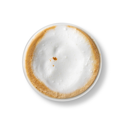 Top view of cappuccino coffee in white cup isolated on white background. Clipping path included