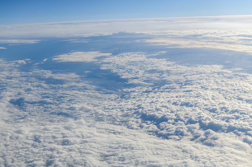 Aerial view between clouds