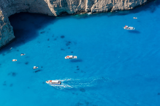 Drone panoramic photo of two boats in the pure blue crystal waters of  Zakynthos Greece