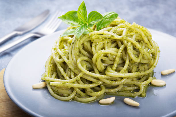 istock Spaghetti with pesto, genoese pesto, basil pesto, close-up. 1346126850