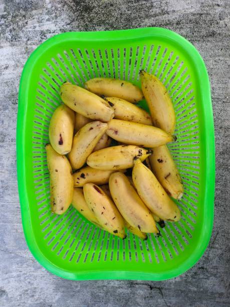 istock pile of small bananas on basket 1346129062
