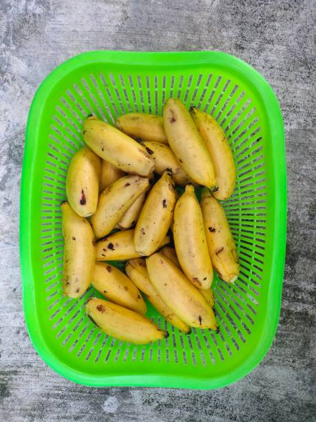 istock pile of small bananas on basket 1346129084