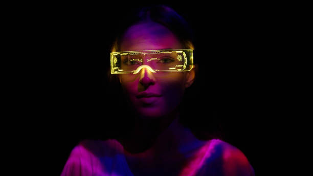 istock Projection on a woman's face wearing futuristic glasses 1346129222