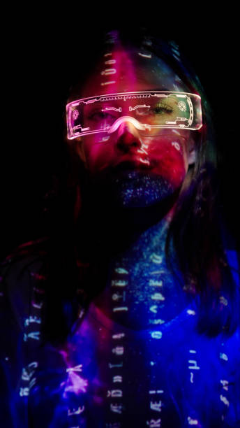 istock Projection on a woman's face wearing futuristic glasses 1346129330