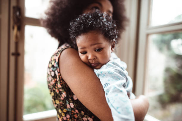 istock woman embracing her little kid 1346129600