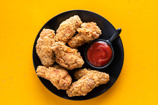 istock Crispy fried chicken wings with tomato sauce 1346129649