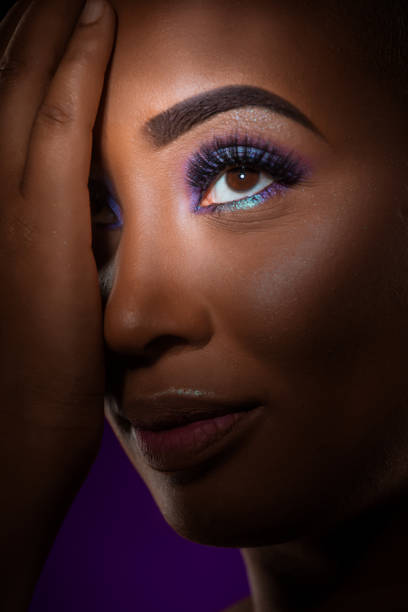 Close up of mixed race female eye, eyebrow, eyelashes and makeup