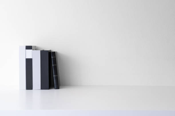 istock Office desk workspace with books on white background. Front view with copy space. 1346130766
