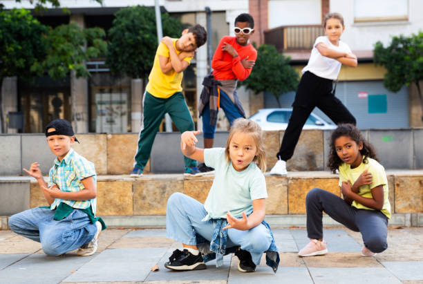 istock Modern tweenagers performing street dance choreography 1346134451