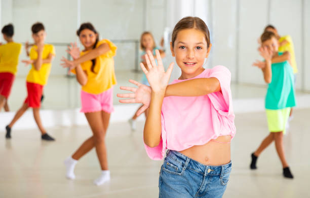 istock Dance class for kids, girls and boys training in dance studio 1346135496