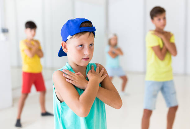 istock Group of kids performing hip-hop dance 1346135583