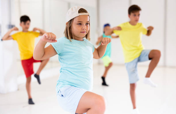 istock Group of kids performing hip-hop dance 1346135595