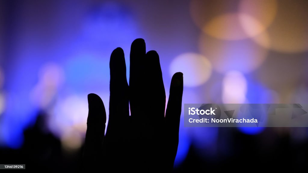 Hand raising concert, Hand raising for religion Silhouette hands Hand Stock Photo