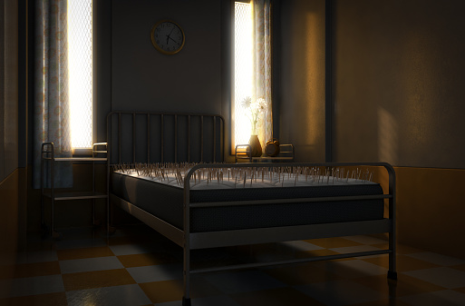 A literal metaphor showing a metal framed bed with a mattress covered in nails in a vintage looking secure hospital room with morning light - 3D render