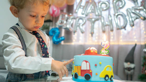 istock Adorable little boy celebrating second birthday 1346140792