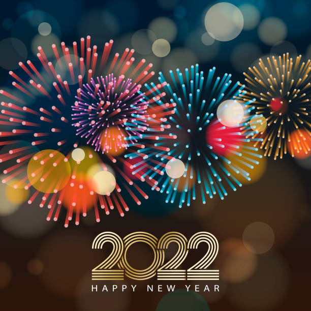2022 New Year’s Eve Fireworks Spectacular Enjoy the fireworks spectacular for the New Year' Eve 2022 with outline of gold colored 2022 glittering on the colorful fireworks and sparkling light background fireworks and sparklers stock illustrations