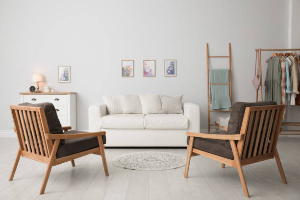 istock Modern living room interior with comfortable sofa and armchairs 1346142377