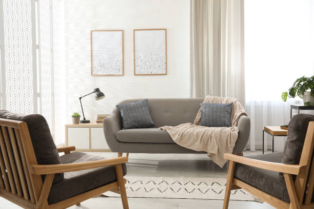 istock Modern living room interior with comfortable sofa and armchairs 1346142528