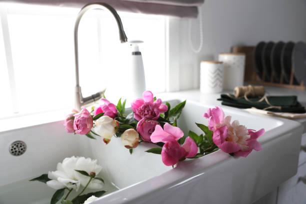 istock Bunch of beautiful peonies in kitchen sink 1346142991