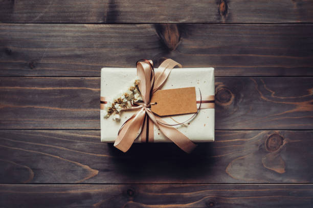 istock Craft gift box on table wooden background with copy space 1346143803