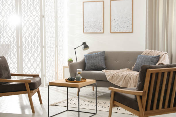 istock Modern living room interior with comfortable sofa and armchairs 1346143806