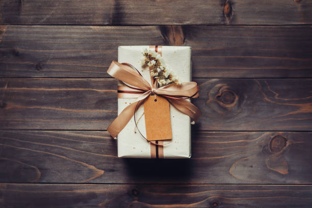istock Craft gift box on table wooden background with copy space 1346143848