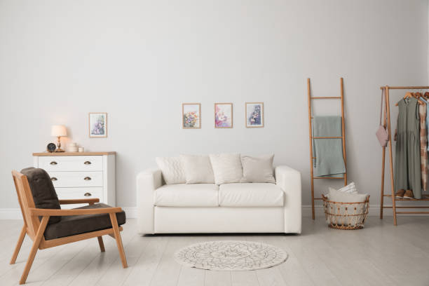 istock Modern living room interior with comfortable sofa and armchair 1346144410