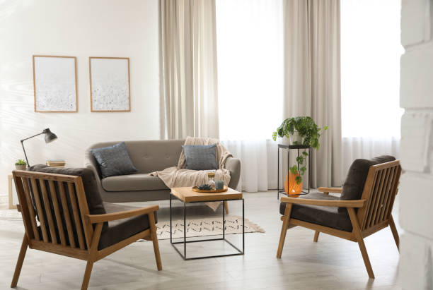 istock Modern living room interior with comfortable sofa and armchairs 1346144664