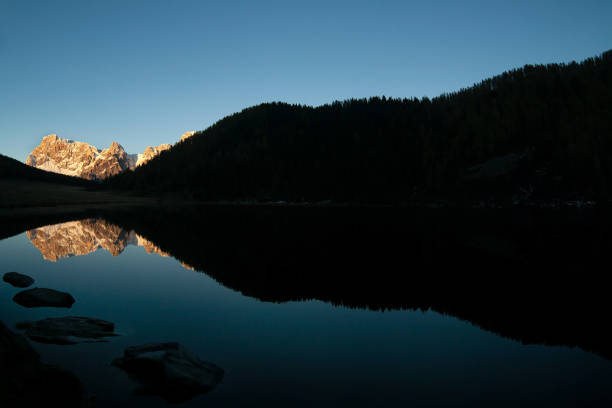 istock dolomites landscape and reflection on calaita lake 1346145789