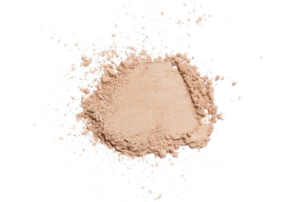 istock beige powder on a white background 1346146027