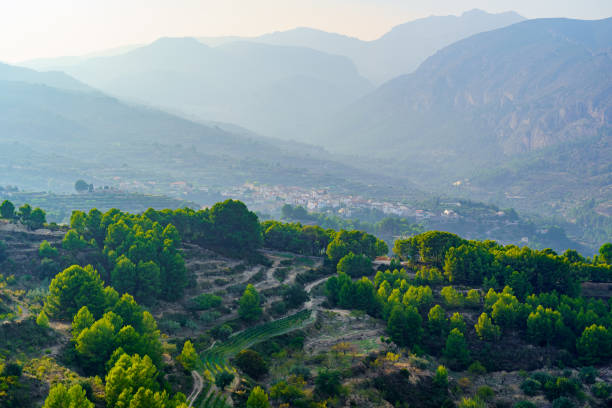 istock Mountains in misty environment with different layers on the horizon. 1346152720