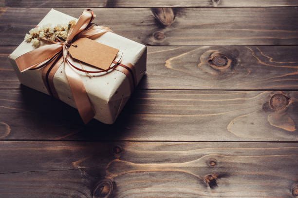 istock Craft gift box on table wooden background with copy space 1346154157