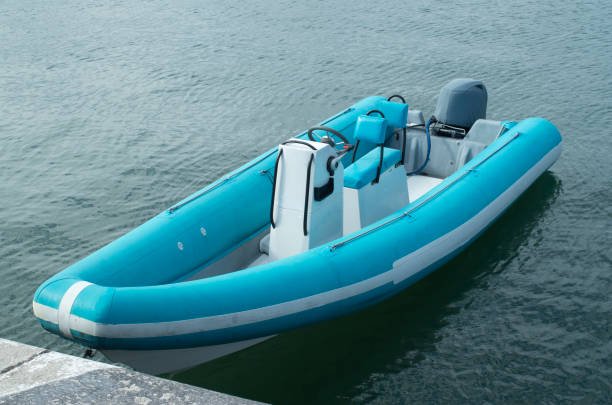 istock Blue and white judge's boat moored at the pier 1346158046