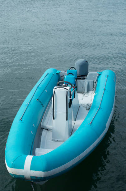 istock Blue and white judge's boat moored at the pier 1346158048