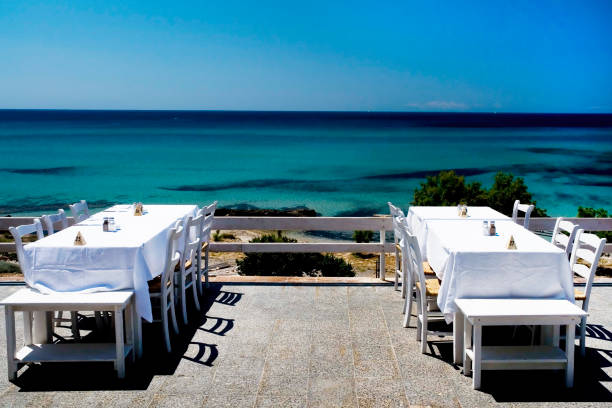 istock Summertime Dinner tables near the sea 1346158055