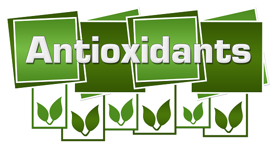 Antioxidants text written over green background.