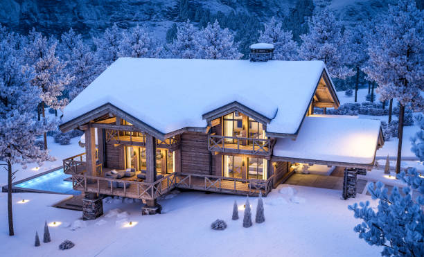 istock 3d rendering of modern cozy chalet in winter night 1346160378