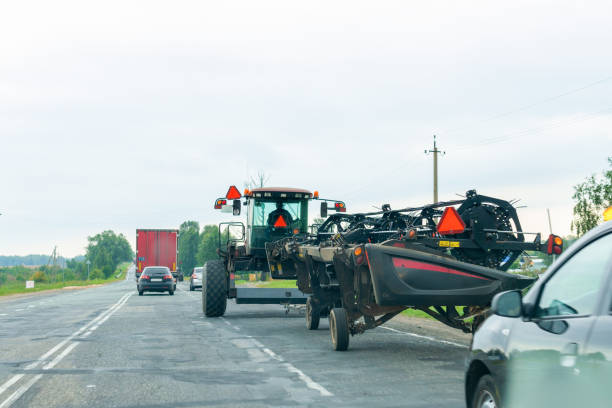 istock Tractor rides on the way to work for the harvest. 1346161681