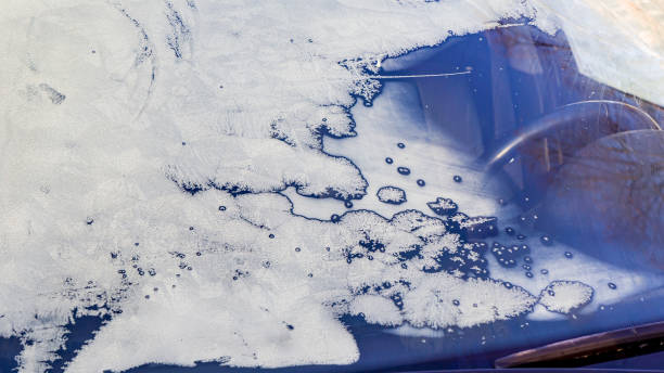 istock Winter frozen front window car, ice glass freeze texture background 1346161754