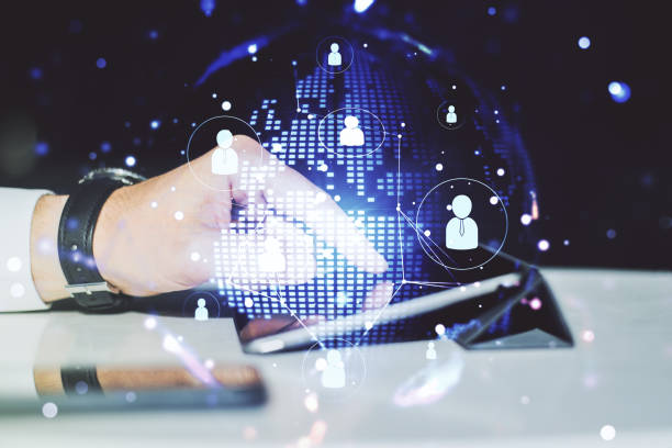istock Social network media concept with world map and finger presses on a digital tablet on background. Double exposure 1346161827