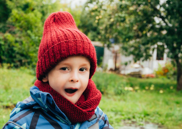 istock Child expresses emotions outdoors, amaze and wow 1346163438