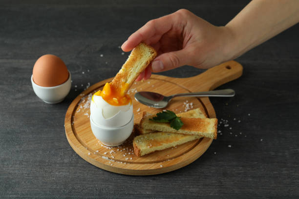 istock Concept of tasty breakfast with boiled eggs, close up 1346164017