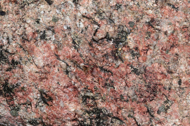 istock Granite stone wall texture in a detailed close up view in a high resolution. 1346167654