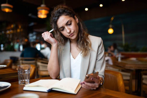 istock A young business woman is working on a new project and devising a new strategy 1346168758