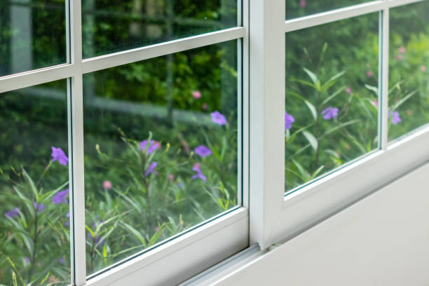 istock defocused summer white window with flower background 1346169399