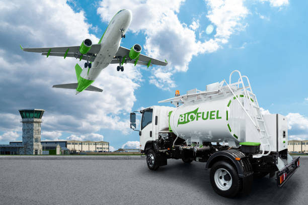 Airplane and truck with biofuel tank stock photo
