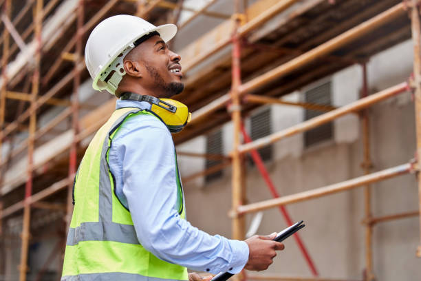 istock Shot of a young man working on a construction site outside 1346171122