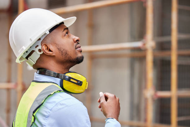 istock Shot of a young man working on a construction site outside 1346171125