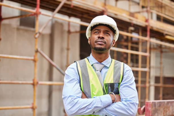 istock Shot of a young man working on a construction site outside 1346171131